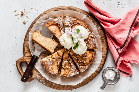 Apple Cake with Slices of Apple on Top Served with Ice Creamの写真素材