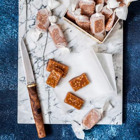 Wrapping Sesame Seed Caramel Candies, Homemade Chewy Toffees, squareの写真素材