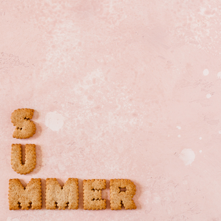 Crackers Arranged as a Word Summer, copy space for your text, squareの写真素材