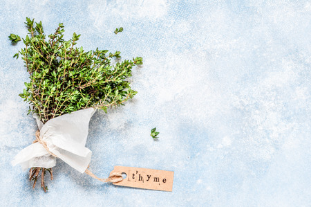 A Bunch of Fresh Thyme Wrapped in Paper, copy space for your textの写真素材