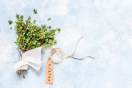 A Bunch of Fresh Thyme Wrapped in Paper, copy space for your textの写真素材