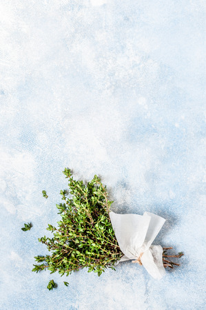 A Bunch of Fresh Thyme Wrapped in Paper, copy space for your textの写真素材