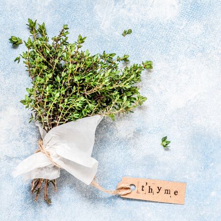 A Bunch of Fresh Thyme Wrapped in Paper, squareの写真素材