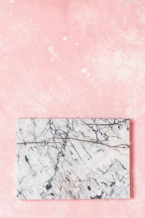 Marble Board on Pink Concrete Background, copy space for your textの写真素材