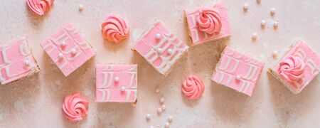 Pink Monochrome Desserts, White Chocolate Glaze Shortbread Squares and Meringues, bannerの写真素材
