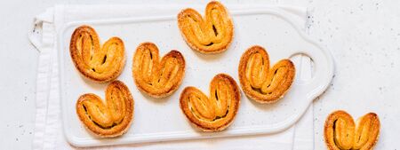 Palmier, Puff Pastry Biscuits, French Elephant Ear Cookies, bannerの写真素材