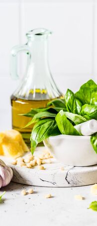 Pesto Ingredients: Fresh Basil, Pine Nuts, Olive Oil and Cheese, bannerの写真素材