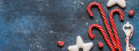 Christmas or New Year Card with Candy Canes and Gingerbread Cookies, banner, copy space for your...