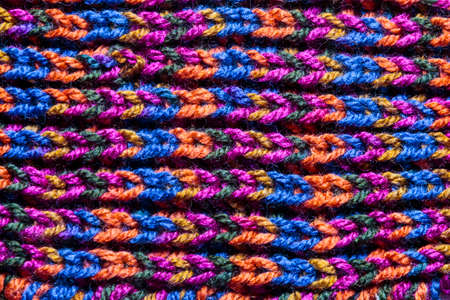 Macro backdrop of a handmade woolen fabric