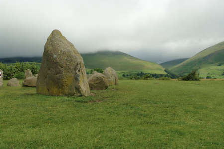 standing stones and mountainsの写真素材