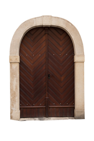Old wooden doors with stone frame isolated on white background.の写真素材