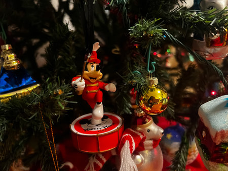 Beautiful festive glass decorations on the Christmas tree. Close-up. Beautiful Christmas background. The concept of decorations and decor for the new year. New Year card 2024. High quality photoの写真素材
