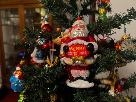 Beautiful festive glass decorations on the Christmas tree. Close-up. Beautiful Christmas background. The concept of decorations and decor for the new year. New Year card 2024. High quality photoの写真素材