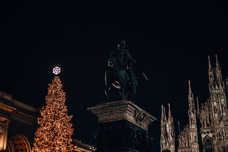 Milan, Italy 12/18/2023 in winter. Christmas tree in front of Milan cathedral, Duomo square in December, evening view. Christmas holidays in Milan. Christmas and New Year concept. High quality photoの写真素材