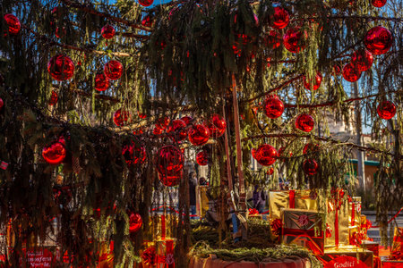 Winter holidays in Italy. Beautiful New Year tree with gifts in the center of Bergamo, Italy.の写真素材