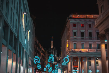 Milan at Christmas. Holiday in the capital of Italy. Christmas decorations of the city against the backdrop of the evening city. New year without snow. Christmas decorations. Milan, Italy 6.12.2023のeditorial素材