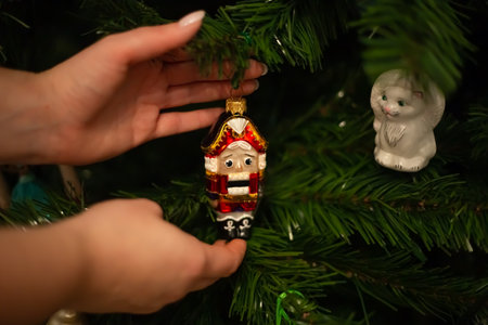 Milan, Italy 15.12.2023. New Year toys Disney characters on the New Year tree. New Years toys on the Christmas tree close-up. Holidays background, winter seasonのeditorial素材