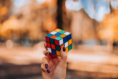 The Rubiks Cube was popular in the 90s. Childhood without the Internet. Rebus, puzzle. Concept of...