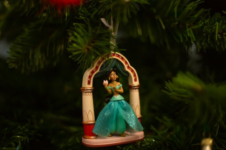 Milan, Italy 15.12.2023. New Year toys Disney characters on the New Year tree. New Years toys on the Christmas tree close-up. Holidays background, winter seasonのeditorial素材