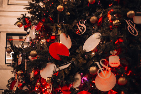 Milano Christmas. Christmas tree in the heart of Milan from Victoria Secret in Galleria del Corso. Night photography of the city. Milan, Italy 6.12.2023のeditorial素材