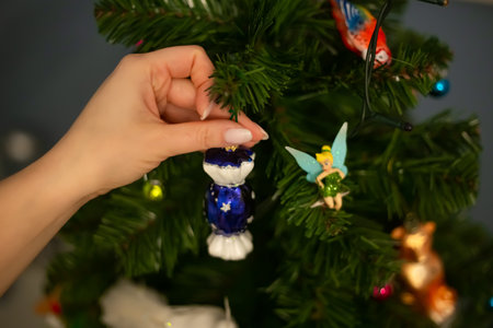 Milan, Italy 18.12.2023. Christmas tree decorated with beautiful glass toys. Christmas conceptのeditorial素材