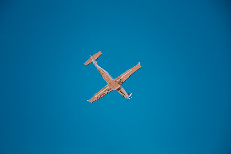 Italy, San Donato Milanese 14.12.2023. Airplane against blue skyのeditorial素材