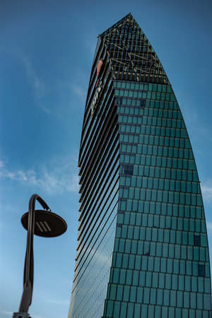 Facade of a skyscraper against a background of blue sky. Milano City Life district, Milan, Lombardy,...