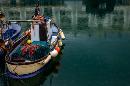 Fishing boats in Genova harbor. Genoa, Liguria, Italy 25.04.2024