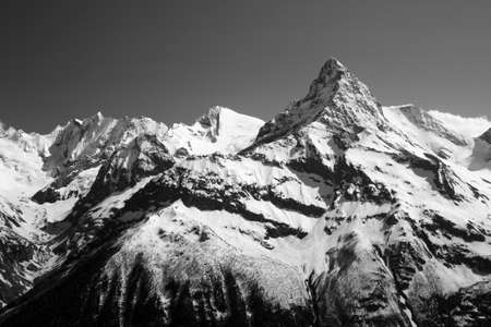 The white tops of the mountains in summer, black and white and grayscale images.