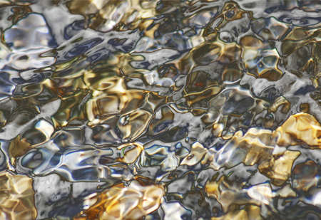 Abstract background of shining gold and silver tonesの写真素材