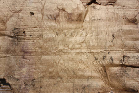 The structure is very old papers. battered, spotted, torn, dark, light. A variety of degradation of paperの写真素材