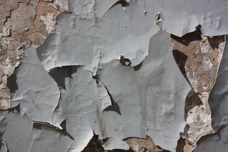 Abstract old grunge cracked paint background texture with scratchesA variety of colors and materialsの写真素材