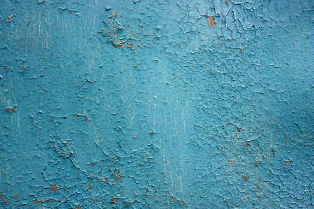 Cracked old paint blue on hardboard
