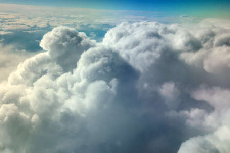 View from window of a jet plane wing with beautiful weatherの写真素材