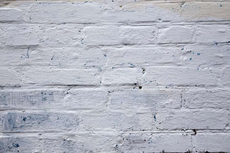 Brick wall painted whitewash, old brickworkの写真素材