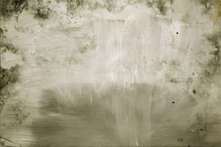 Abstract mottled grunge background texture with spotty pattern wall, old colored rough wall backgroundの写真素材