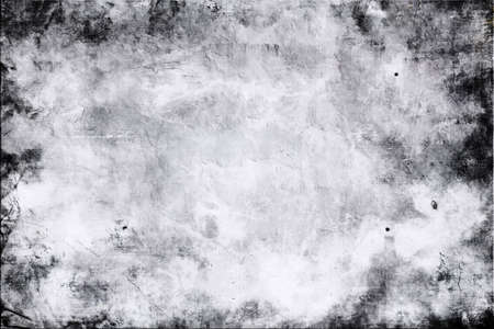 Abstract mottled grunge background texture with spotty pattern wall, old colored rough wall backgroundの写真素材