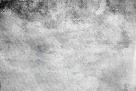 Abstract mottled grunge background texture with spotty pattern wallの写真素材