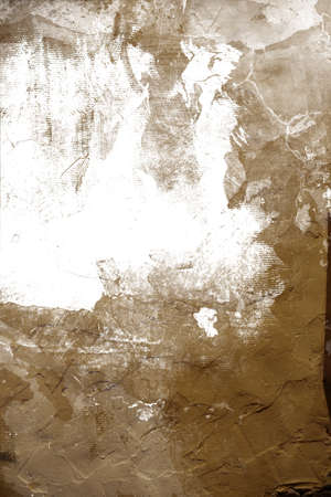 Abstract mottled grunge background texture with spotty pattern wall, old colored rough wall backgroundの写真素材