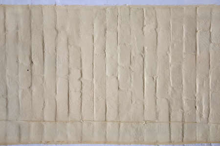 Brick wall painted whitewashの写真素材