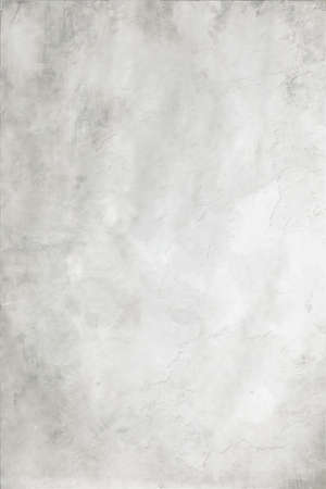 Abstract mottled grunge background texture with spotty pattern wallの写真素材