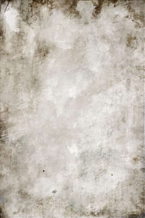 Abstract mottled grunge background texture with spotty pattern wallの写真素材