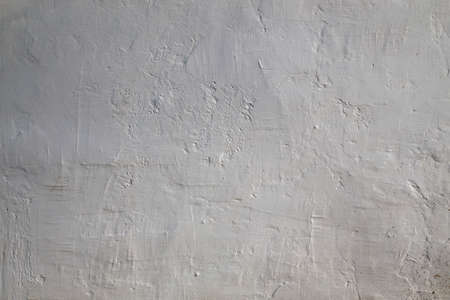 Grunge background a white wall. の写真素材