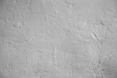 Grunge background a white wall. の写真素材