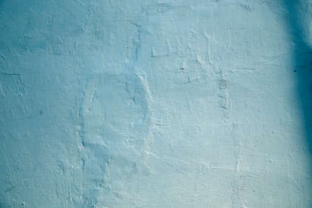 Grunge background blue wall whitewash lime plasterの写真素材