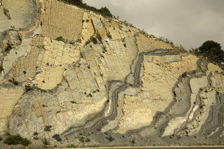 Sculptured Rocks near the road, the destruction of nature by man