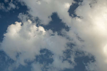 Blue sky and clouds on a sunny day, view the beautiful cloudsの写真素材