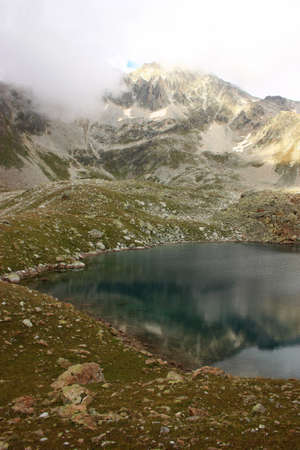Pure mountain lake, Inspiring wilderness of Alpineの写真素材