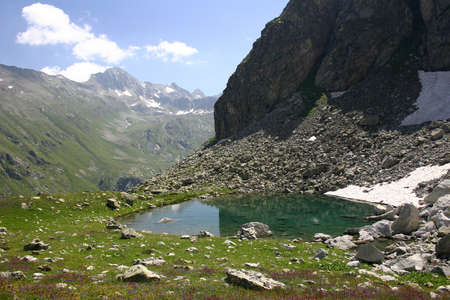 Pure mountain lake, Inspiring wilderness of Alpineの写真素材