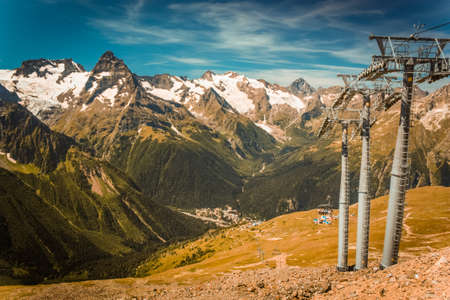 The mountain autumn landscape with colorful forest and high peaks Caucasus Mountainsの写真素材